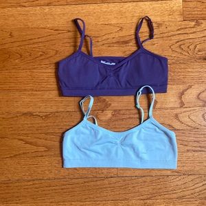 2 medium sized bras. One navy and one sky blue. Hanes brand.
